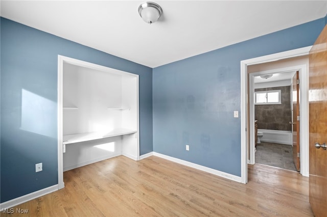 unfurnished bedroom featuring light hardwood / wood-style flooring