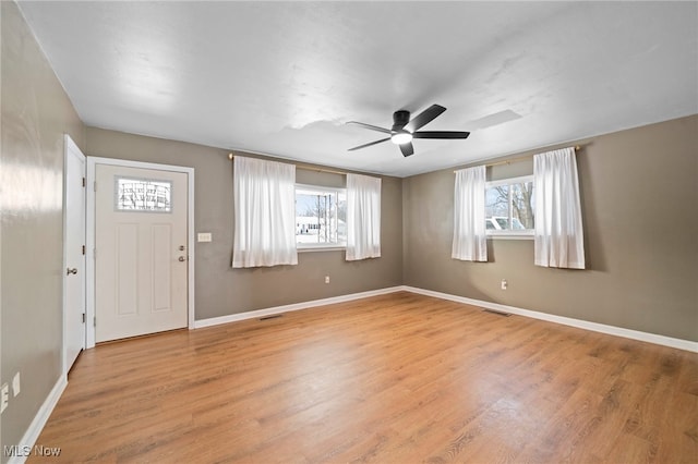 entryway featuring ceiling fan and light hardwood / wood-style flooring