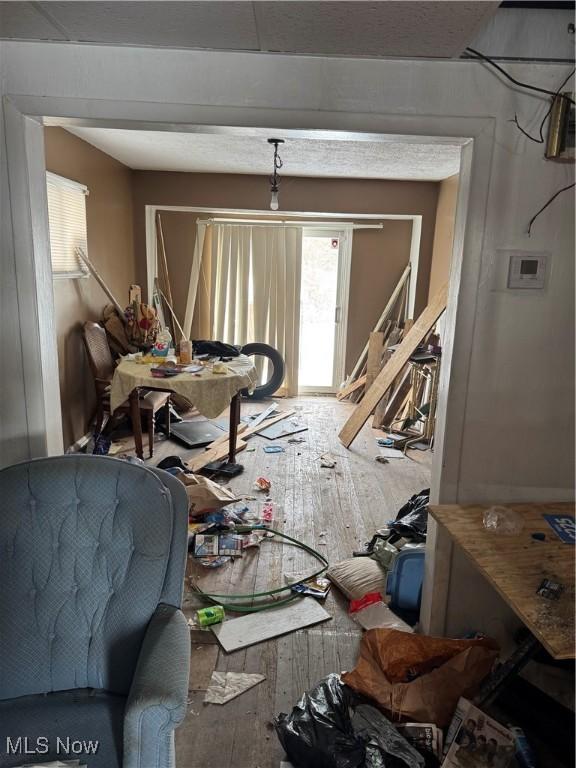 miscellaneous room with wood-type flooring