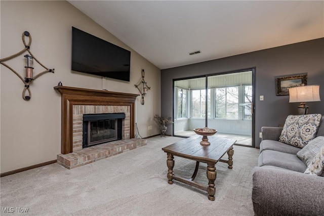 4539 Saint James Cir NW, Canton, OH 44708 - living room featuring light colored carpet, vaulted ceiling, and a brick fireplace