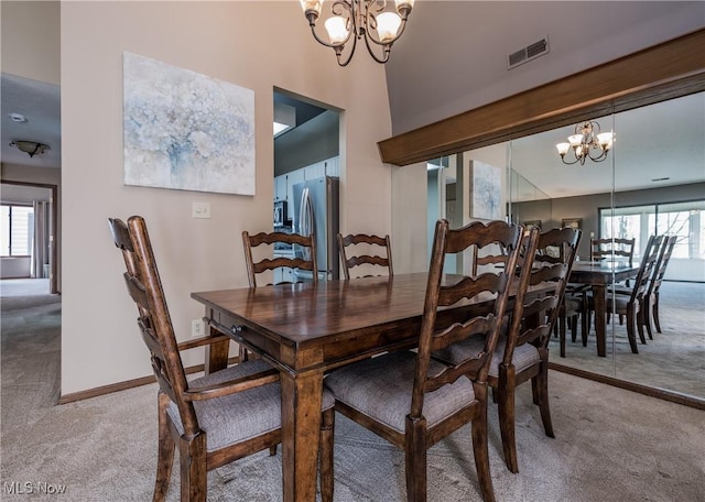 4539 Saint James Cir NW, Canton, OH 44708 - carpeted dining space with a healthy amount of sunlight and a chandelier