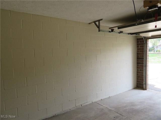 4539 Saint James Cir NW, Canton, OH 44708 - garage featuring a garage door opener