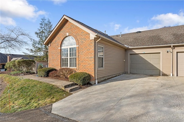 view of property exterior with a garage