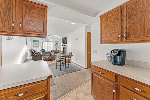 kitchen featuring light colored carpet