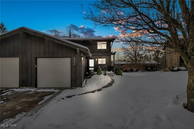 view of front of property featuring a garage