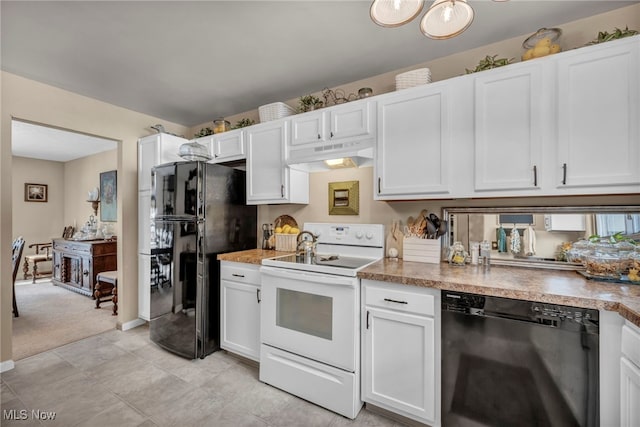 kitchen with white cabinets and black appliances