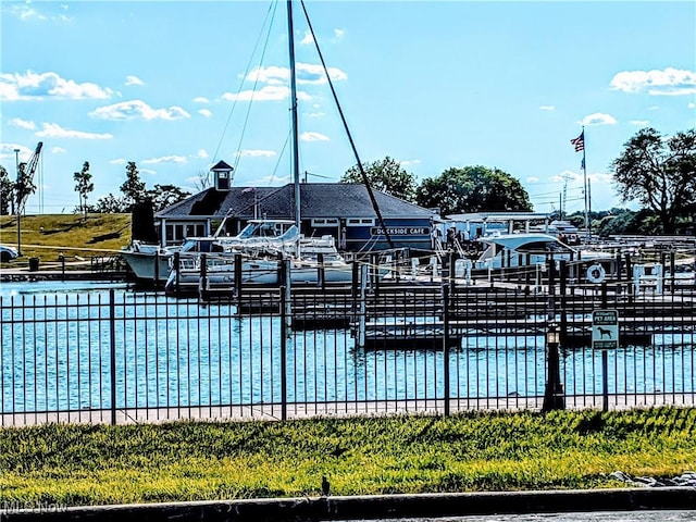 view of pool with a water view