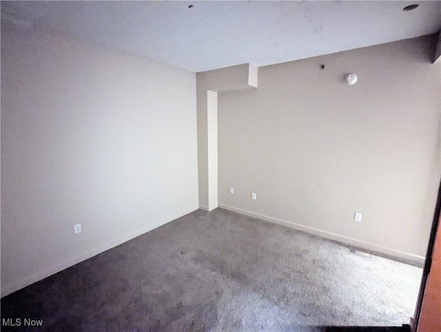 empty room featuring carpet flooring