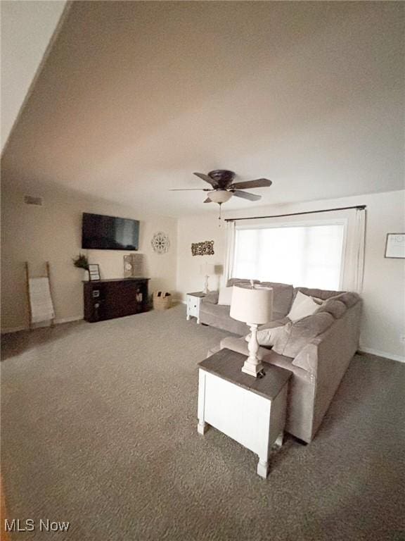 carpeted living room featuring ceiling fan