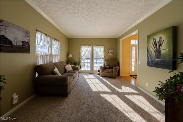 living room featuring ornamental molding, light carpet, and a textured ceiling