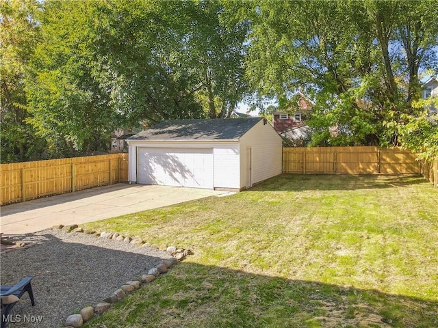 exterior space featuring an outbuilding and a garage