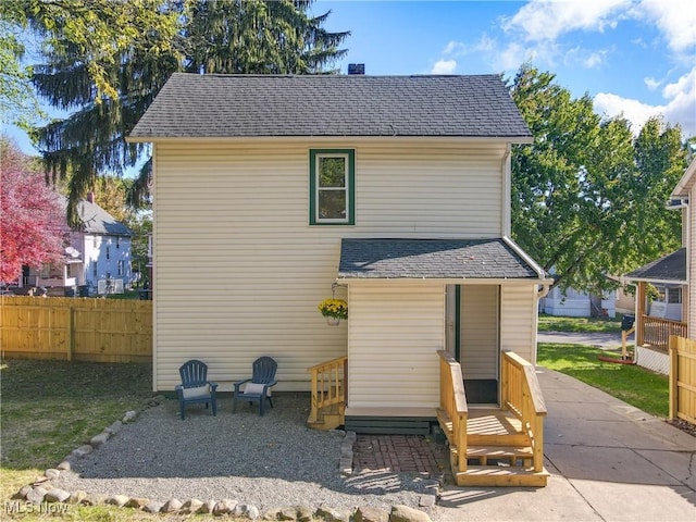 rear view of house featuring a patio area