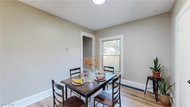 dining room featuring light hardwood / wood-style floors