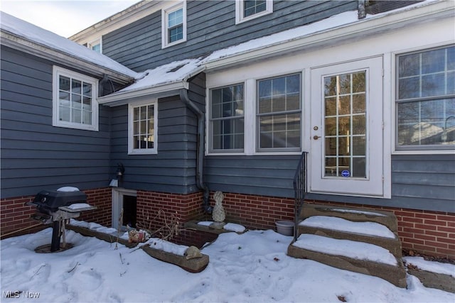 view of snow covered property