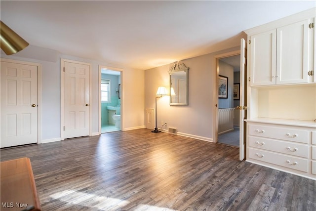 interior space with dark hardwood / wood-style floors