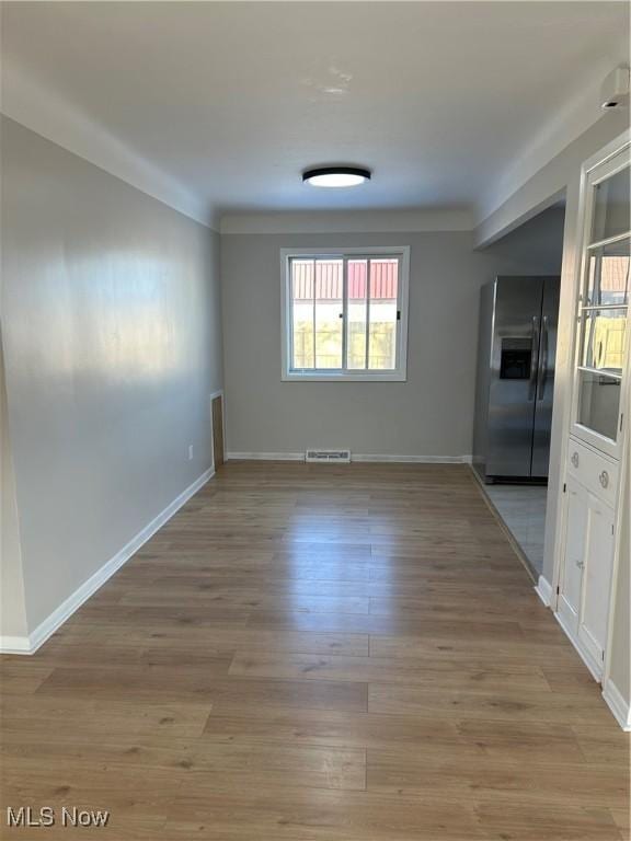 empty room featuring light hardwood / wood-style floors