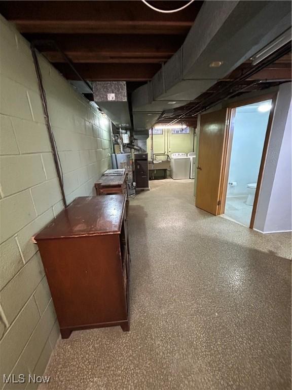 basement featuring washer and dryer