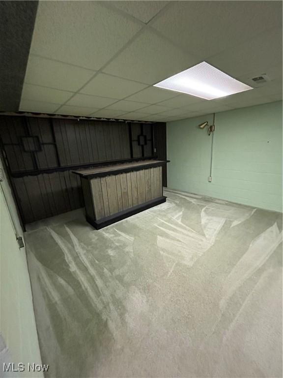 basement with a drop ceiling