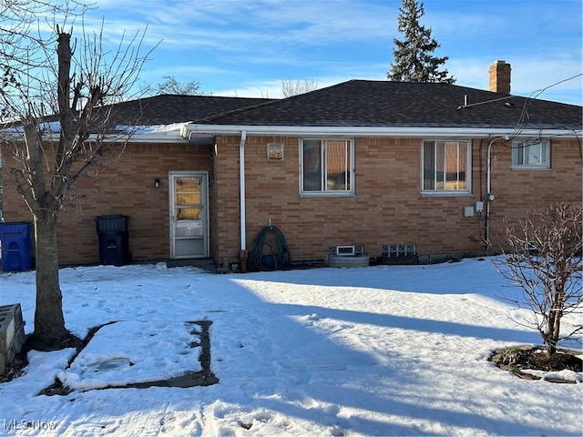 view of snow covered property