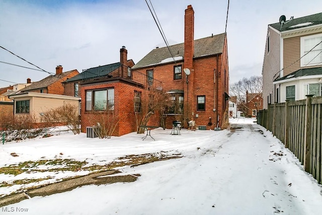 view of snow covered property