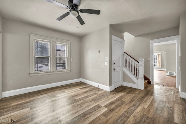 entryway featuring hardwood / wood-style flooring and ceiling fan