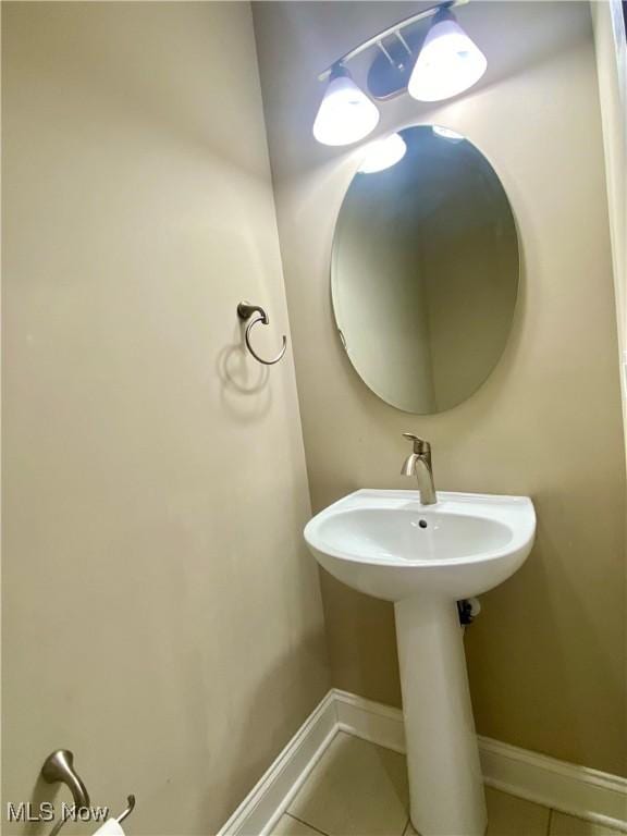 bathroom featuring tile patterned flooring