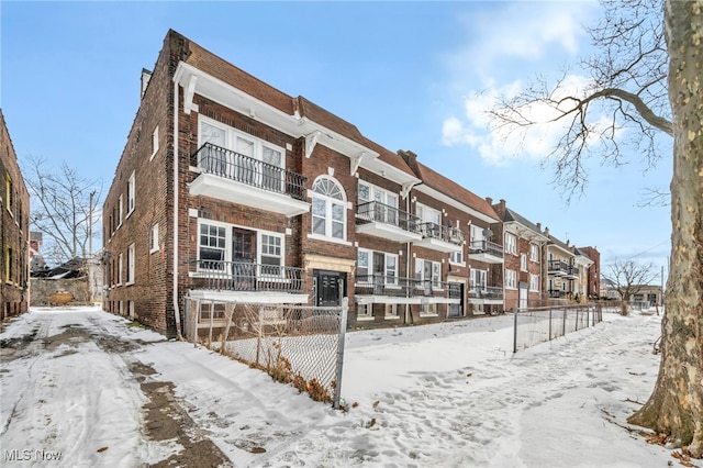 view of snow covered property