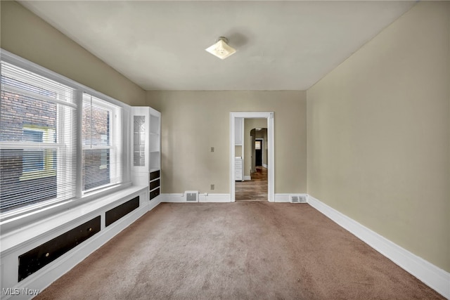 empty room featuring carpet