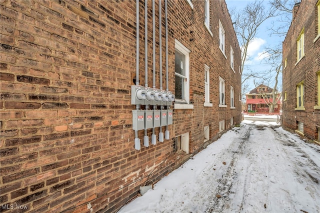 view of snow covered property