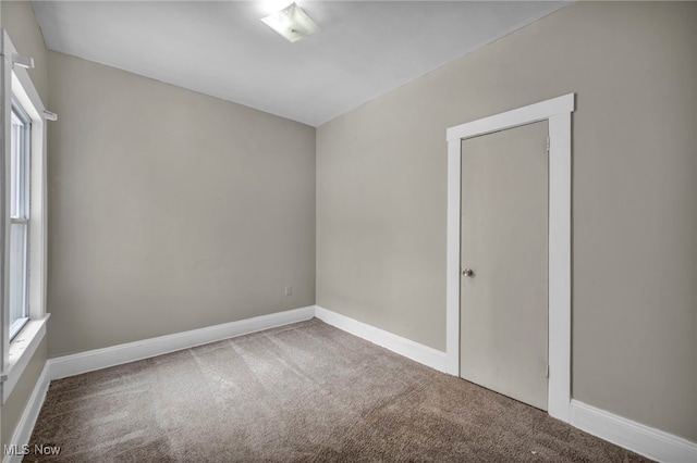 spare room with carpet flooring