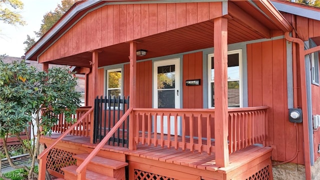 wooden terrace featuring a porch