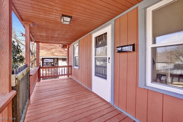 wooden terrace with covered porch