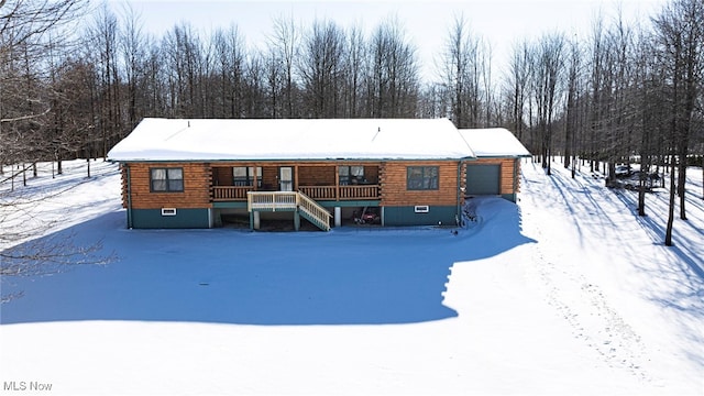 view of snow covered property