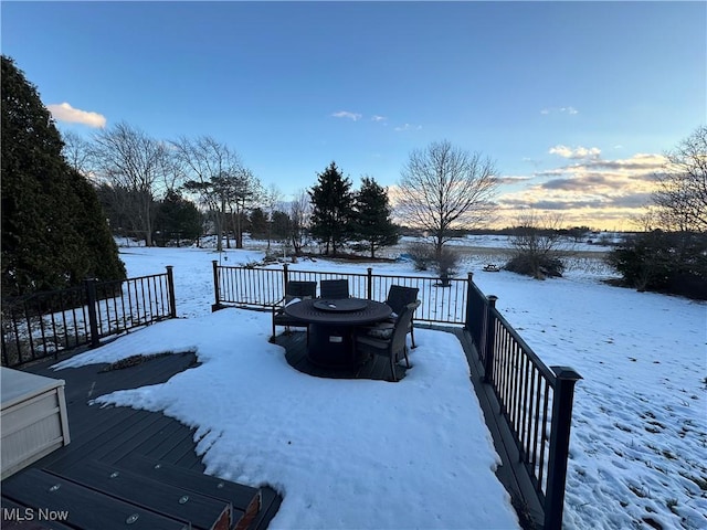 view of snow covered deck