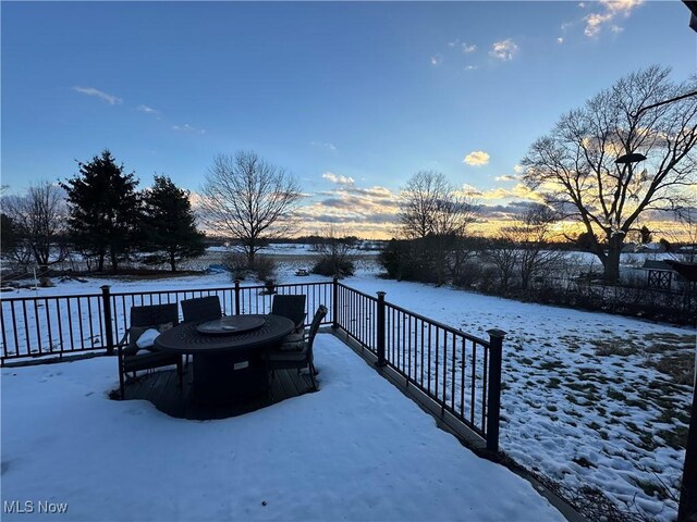 view of snow covered deck