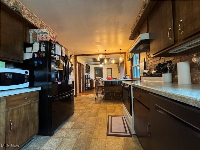 kitchen with white electric stove, dark brown cabinets, and pendant lighting