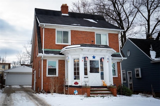 view of front of home with an outbuilding and a garage