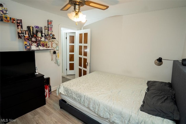 bedroom featuring ceiling fan and wood-type flooring