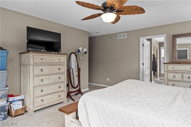 bedroom with ceiling fan and light colored carpet