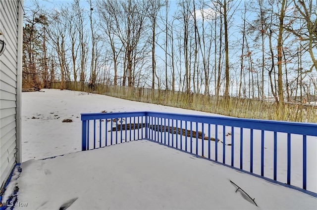 view of snow covered patio