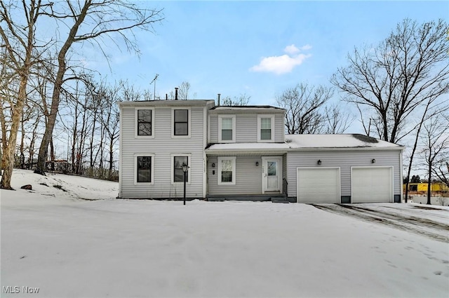 front of property featuring a garage