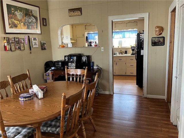 dining space featuring hardwood / wood-style flooring