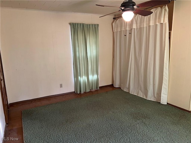 spare room with ceiling fan