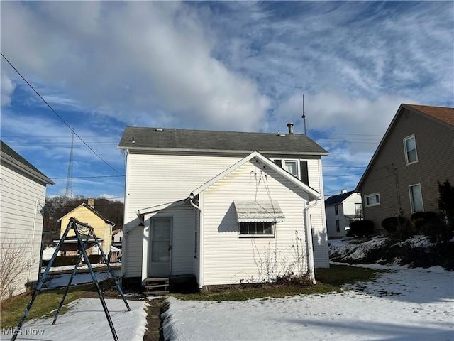 view of snow covered house