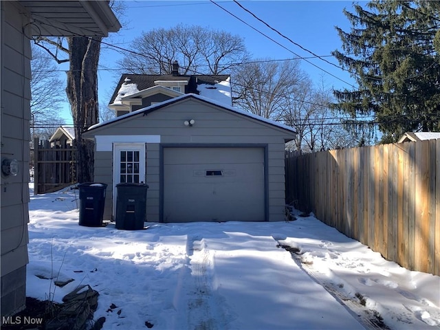 view of snow covered garage