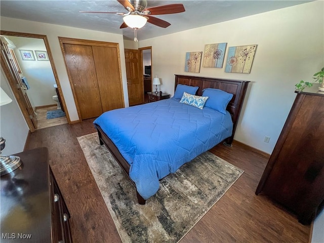 bedroom with ceiling fan, dark hardwood / wood-style flooring, and a closet