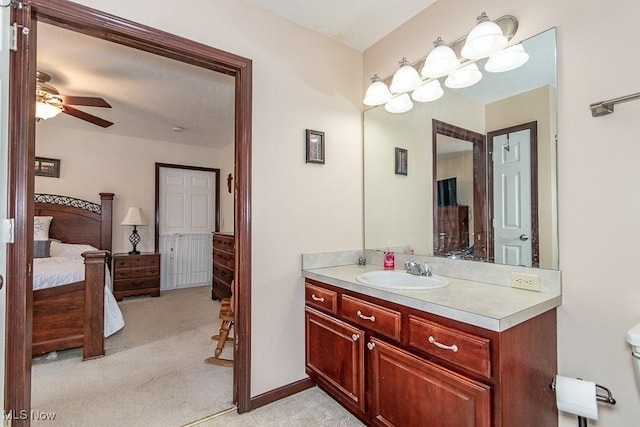 bathroom featuring vanity and ceiling fan