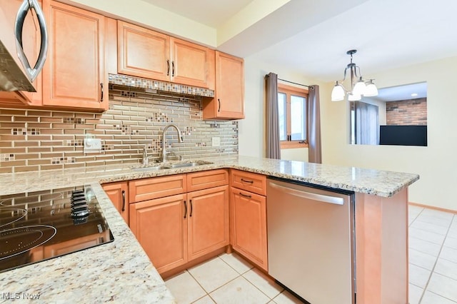 kitchen with light tile patterned flooring, pendant lighting, sink, backsplash, and stainless steel appliances