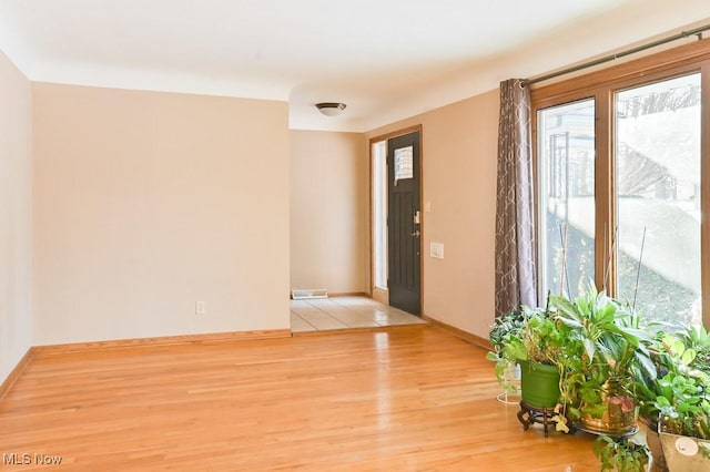 entrance foyer with light hardwood / wood-style floors