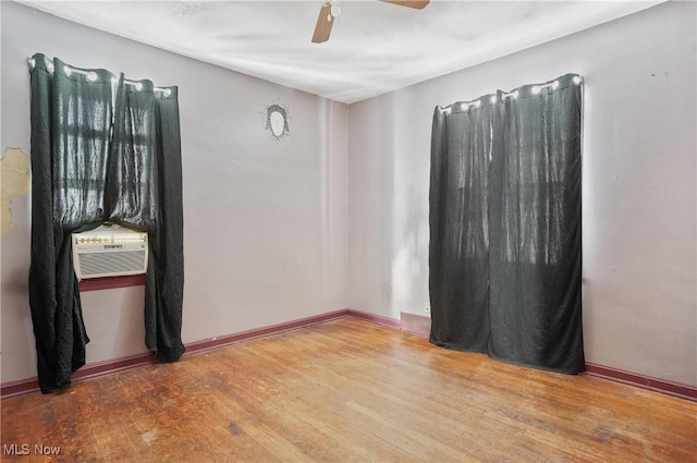 spare room featuring ceiling fan and wood-type flooring